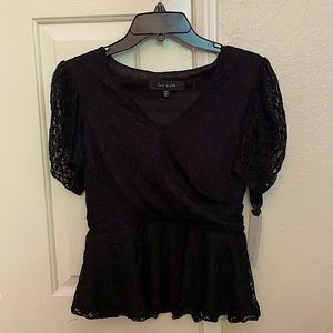 Small black lace blouse, flare hem